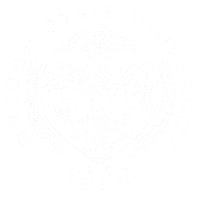 Oregon State University 1868 surrounding President's seal featuring an Oregon trail wagon